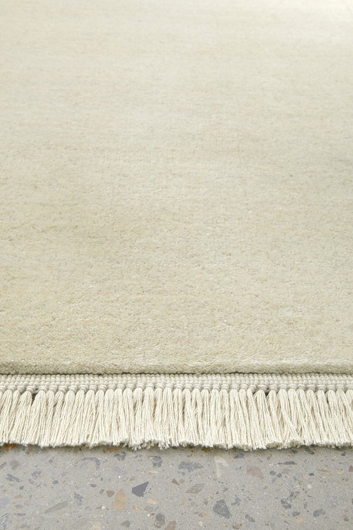 KINSHIP CREAM HAND WOVEN WOOL FLOOR RUG