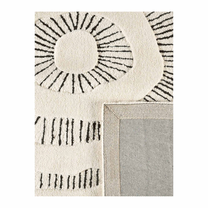 Cluadia Hand Tufted Bone Black Wool Floor Rug