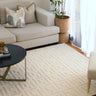 Fabien Hand Tufted Monogram Creme Wool rug