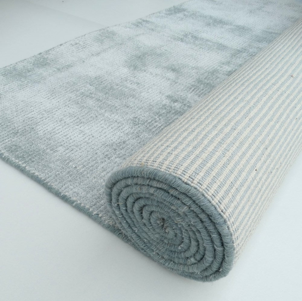 Weft Ice Blue Hand woven floor rug