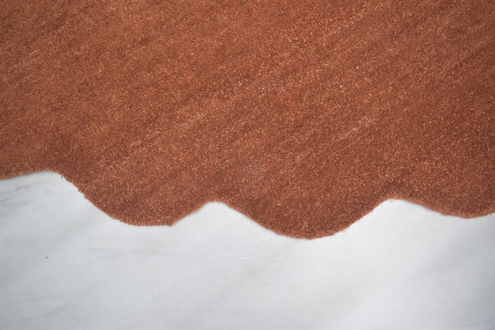 SCALLOPED RUST HAND TUFTED FLOOR RUG