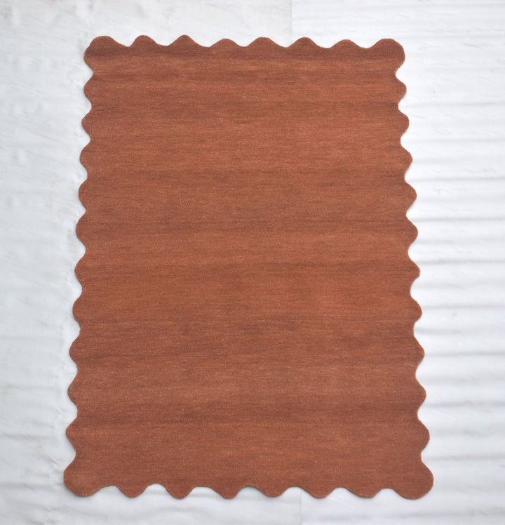 SCALLOPED RUST HAND TUFTED FLOOR RUG