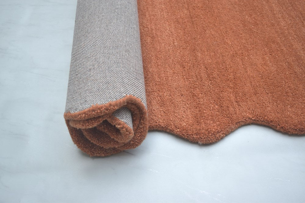 Rust Footprints Rug SCALLOPED RUST HAND TUFTED FLOOR RUG – All Modern Design