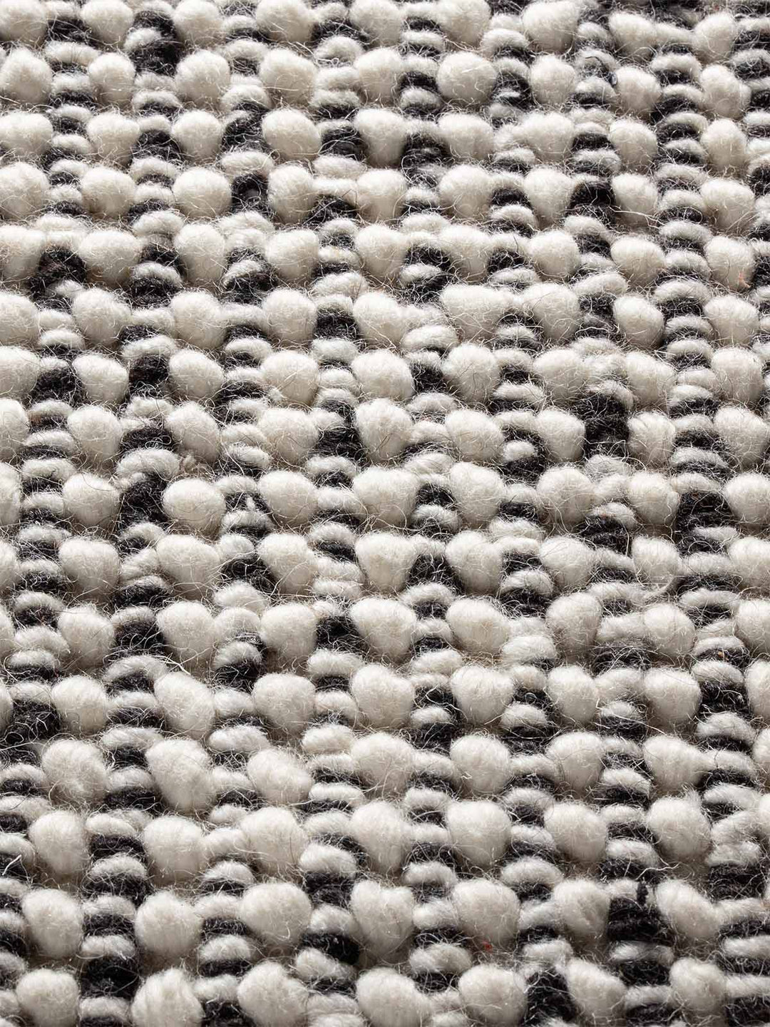 SPIKE BLACK AND WHITE HAND WOVEN FLOOR RUG