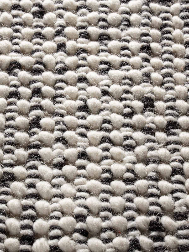 SPIKE BLACK AND WHITE HAND WOVEN FLOOR RUG