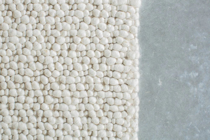 Fish Eye Pebbles white/ Ivory Pure Wool hand woven floor rug
