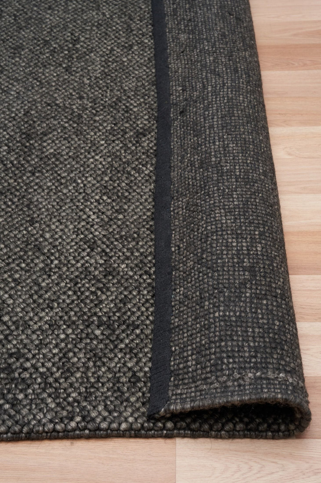Alma Charcoal hand woven pure wool floor rug