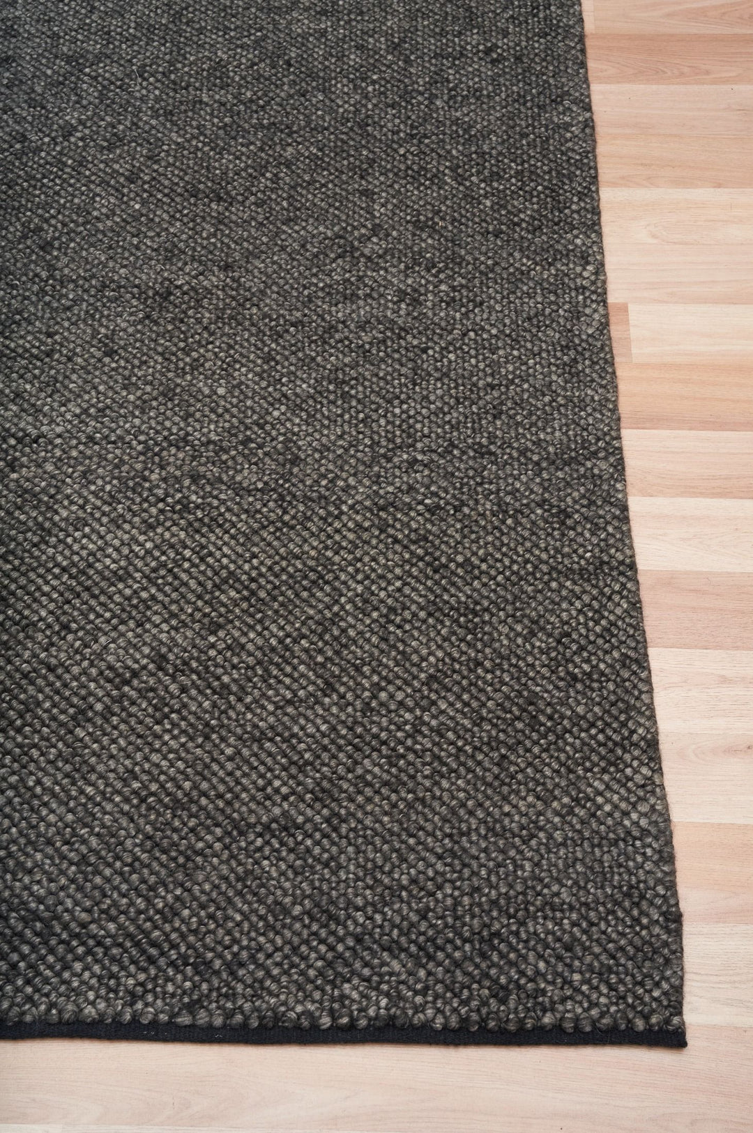 Alma Charcoal hand woven pure wool floor rug