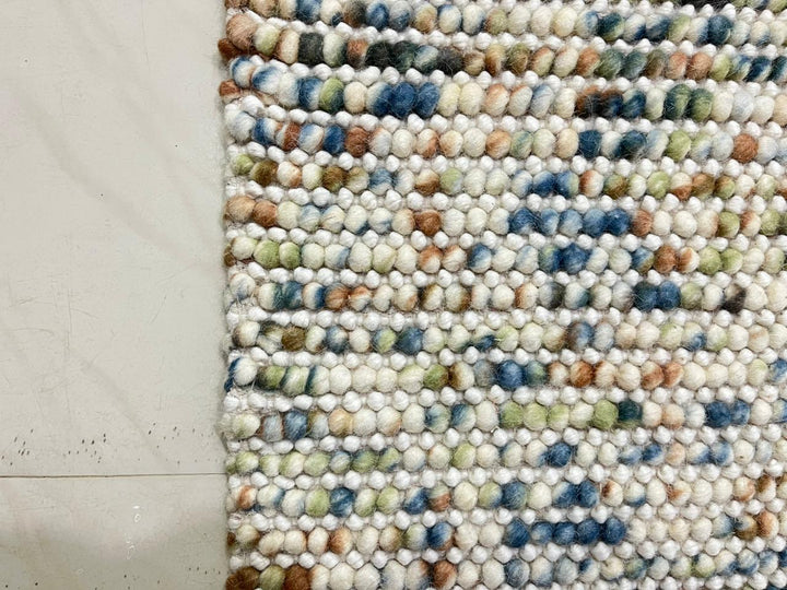 Pebbles Multi Rust hand woven Wool and Cotton floor rug