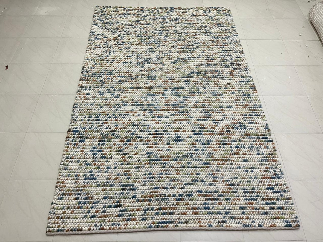 Pebbles Multi Rust hand woven Wool and Cotton floor rug