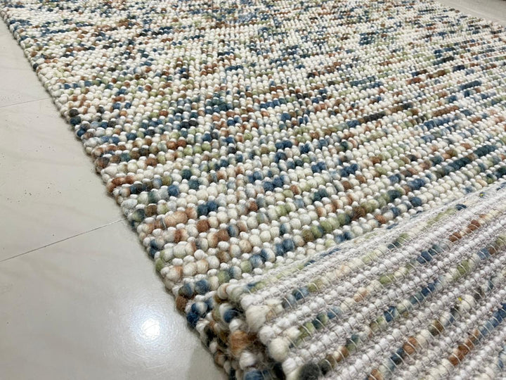 Pebbles Multi Rust hand woven Wool and Cotton floor rug